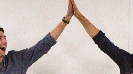 Agrifiber founders high five over their reward check
